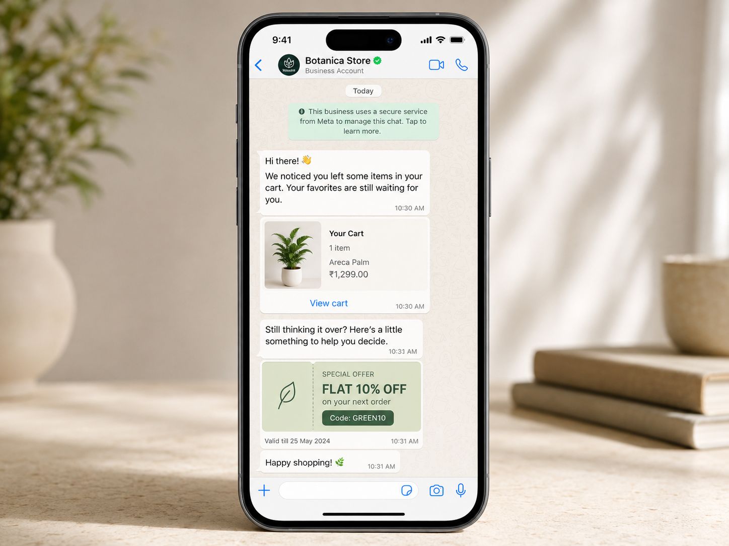 A WhatsApp chat from a store's business account with an abandoned-cart reminder and a discount coupon