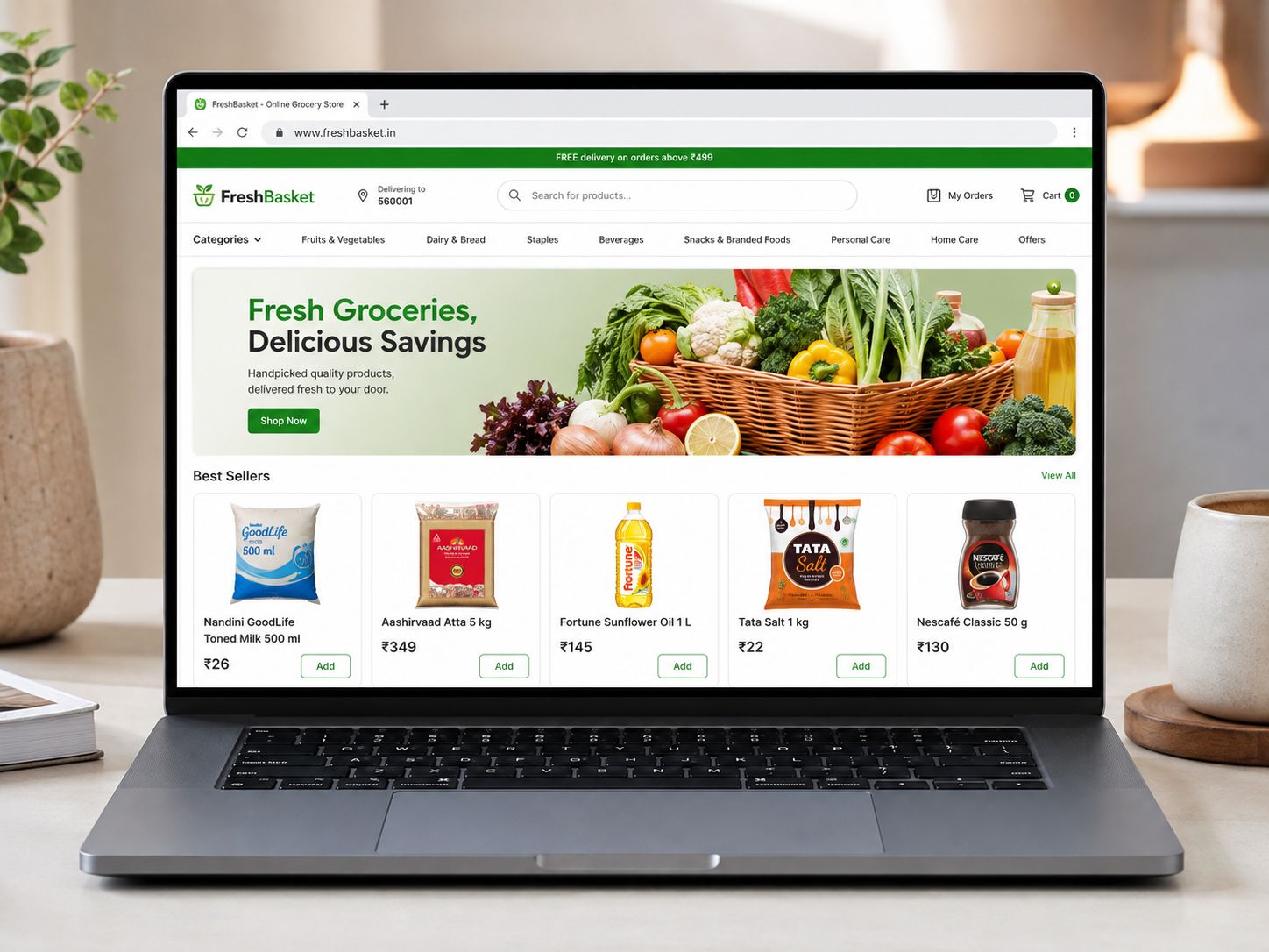 A grocery store's Shoopy storefront on its own domain, freshbasket.in, on a laptop